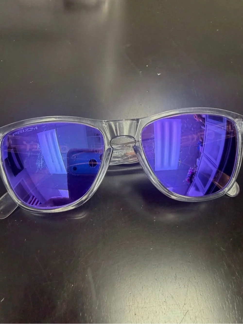Oakley Kids Clear Frame Sunglasses with Purple Mirrored Lenses